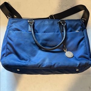 Lo & Sons Brookline navy blue work bag fits rolling suitcase
